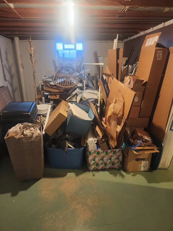 Roll-off dumpster container at job site for 2 Yard Dumpster Rental in Maumee